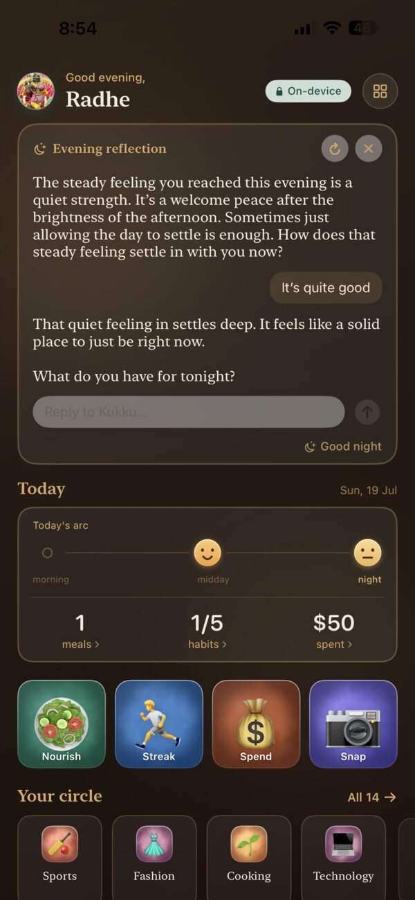 Kukku evening reflection: the app shifts to a warm night theme with a cosy check-in chat and the day's mood arc